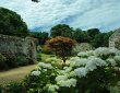 Garten und Mauer mit Gebäuden La Seigneurie